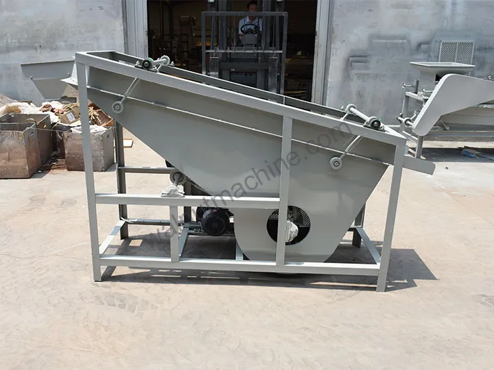 Nut shell and kernel separating machine