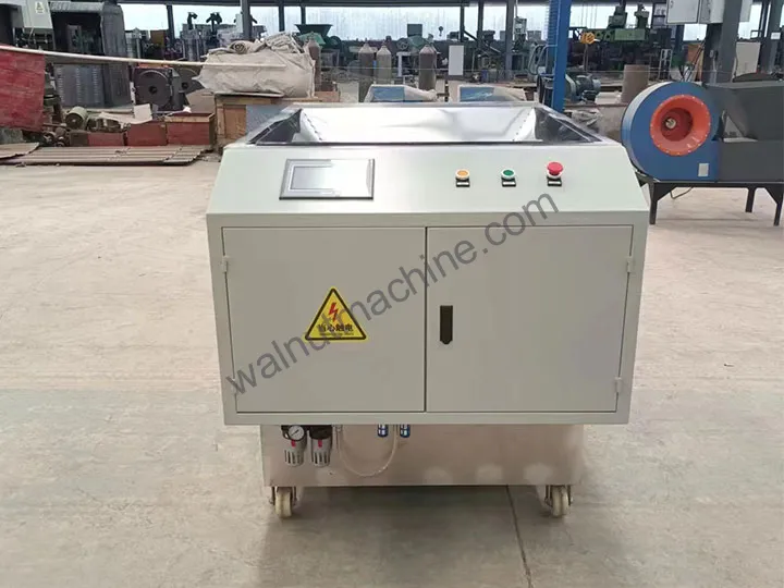 Macadamia nut cutting machine